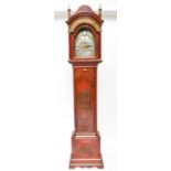 JOSEPH JACKMAN JNR OF LONDON BRIDGE; an English red japanned longcase clock, the brass dial signed
