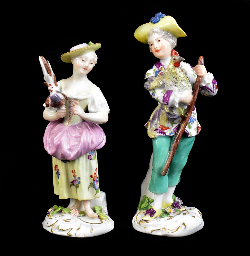 MEISSEN; a pair of mid-18th century figures of children with chickens modelled by Kaendler and