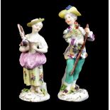 MEISSEN; a pair of mid-18th century figures of children with chickens modelled by Kaendler and