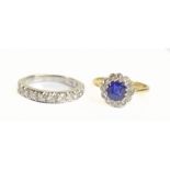 An 18ct yellow gold sapphire and diamond floral set ring, size O 1/2, and an 18ct white gold half