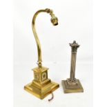 An early 20th century brass adjustable table lamp on square plinth base with relief rococo style