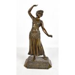 H KECK; an Art Nouveau bronze figure of an exotic dancer on a shaped base, with inscribed signature,