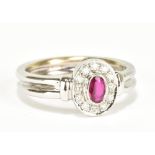 An 18ct white gold ruby and diamond ring, size M, approx 5.3g.