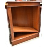 A reproduction mahogany open bookcase.