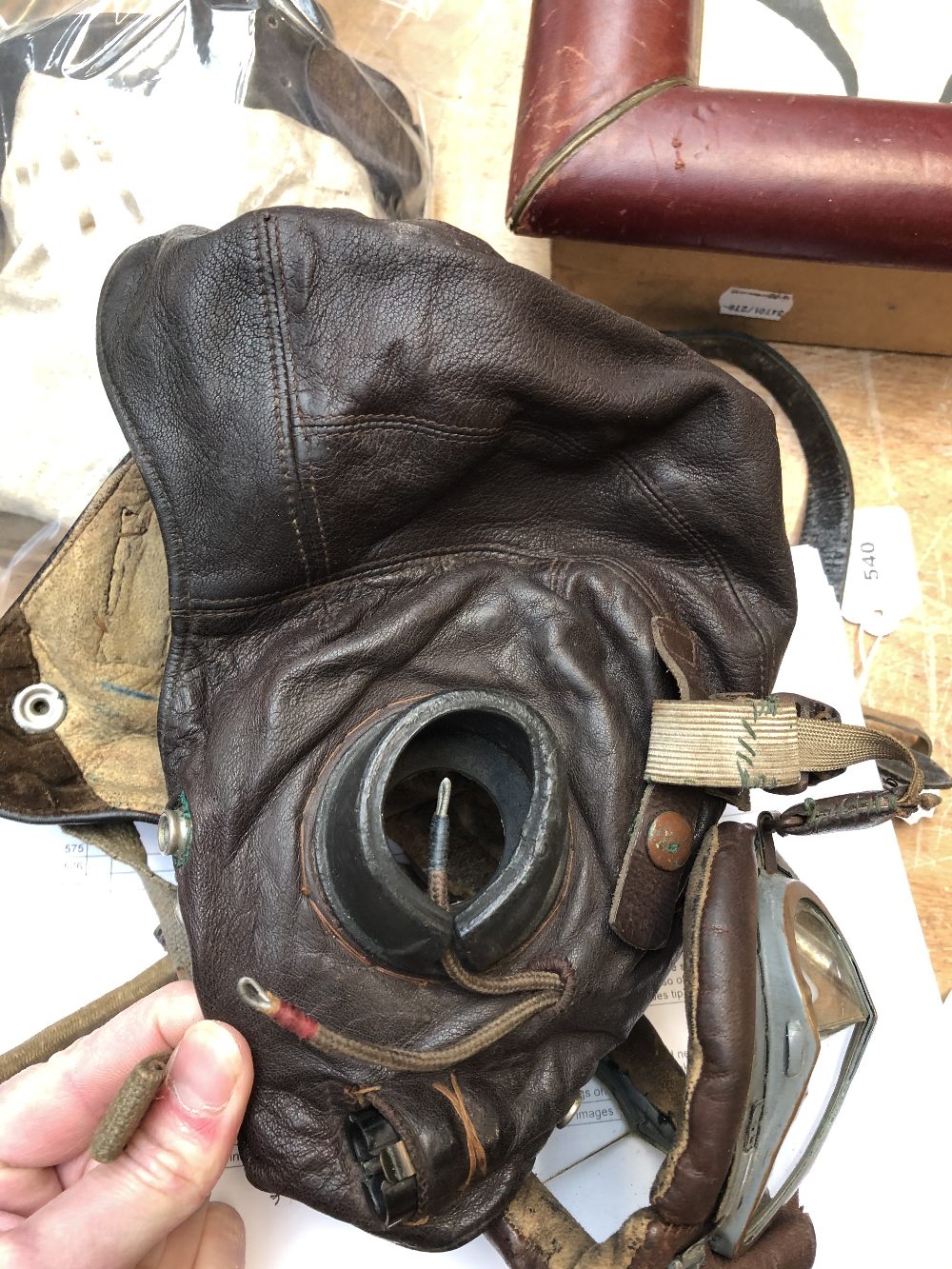 A group of military equipment and accessories including four leather flying helmets/caps, an RAF - Image 11 of 16