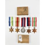 A WWII naval medal group of five comprising War Medal, 1939-1945, Africa, Italy and Atlantic Stars