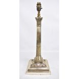A late 19th century electroplated Corinthian column table lamp converted to electricity, with relief