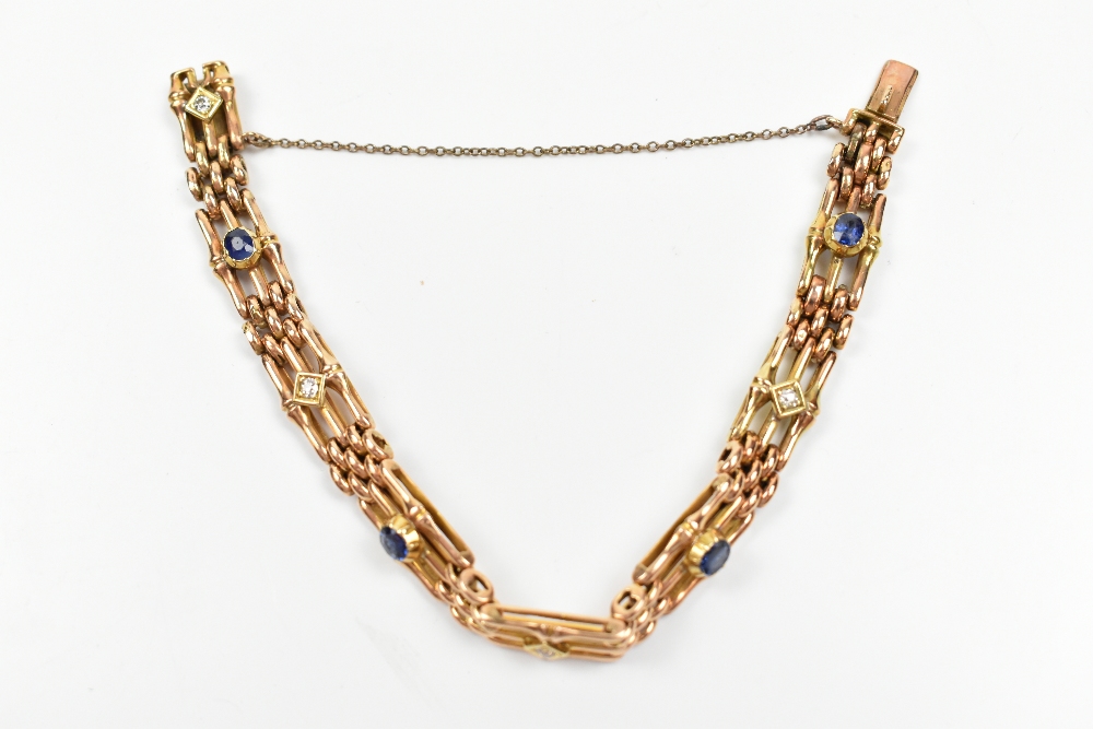 A 15ct yellow gold bracelet set with four alternate sapphires and diamonds in an openwork frame,