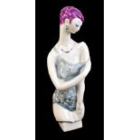 MEISSEN; a 20th century stylised half length model of a scantily clad young woman designed by Silvia
