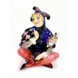 LESLIE HARRADINE FOR ROYAL DOULTON; HN1284 'Lady Jester Seated' circa 1928-38, second version