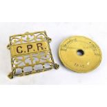 STEAM INTEREST; a brass standing/going register dated 1832, diameter 14.5cm and a C.P.R (Canadian