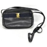 SALVATORE FERRAGAMO; a navy blue textured leather handbag with bow detail and gold hardware, 23 x 15