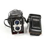 YASHICA 24; a camera with Yashinon 1..3, 5 lens fitted in carrying case.
