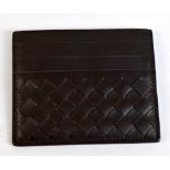 BOTTEGA VENETA; a dark brown leather card wallet, 10 x 8cm, with original box and dust bag.