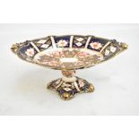 ROYAL CROWN DERBY; a pedestal comport decorated in the 8731 pattern, height 12cm.Additional