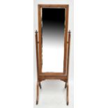 A cheval dressing mirror with bevelled glass.