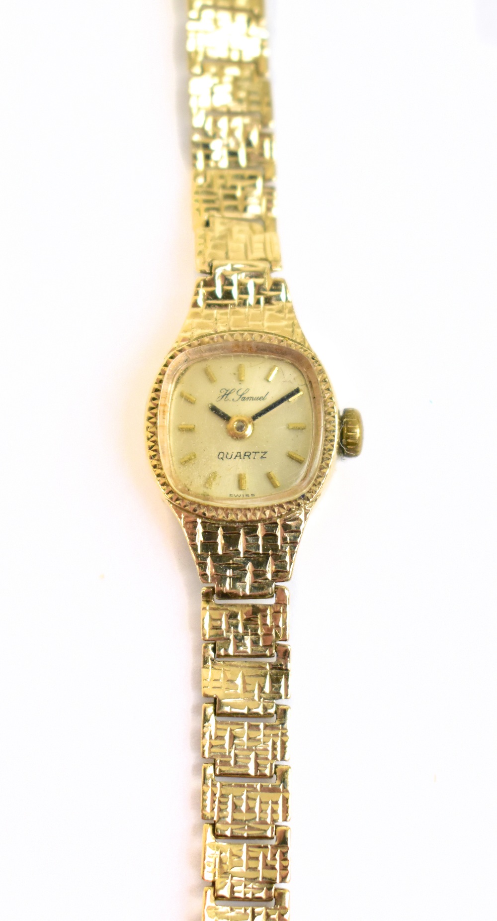 A lady's 9ct yellow gold wristwatch, the dial set with baton numerals, approx 10.3g.Additional