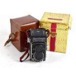 FRANKE & HEIDECKE; a camera, fitted in leather pouch and original cardboard box.