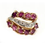 THE FRANKLIN MINT; 'The Fabergé Firebird Ring', a 14ct yellow gold ruby and diamond cluster ring set