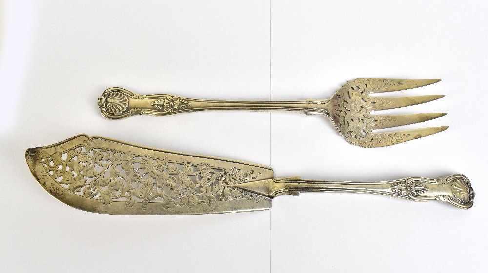 A pair of Victorian hallmarked silver King's pattern fish servers with pierced blades, London