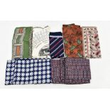 Four Paisley silk gentleman's long scarves, a silk red, grey and navy blue Concorde square scarf and