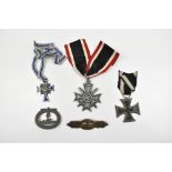 A group of German medals comprising WWI Iron Cross, a Third Reich Cross of Honour of the German