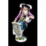 MEISSEN; a mid-18th century figure of 'The Map Seller' from the "Cris de Paris" series with Saxony