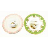 COALPORT; two hand painted and gilt heightened fish plates with green and pink borders respectively,