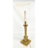 An early 20th century brass Corinthian column table lamp, height excluding fitting 37.5cm.