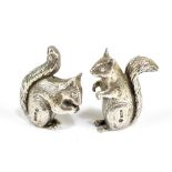 CJ VANDER; a pair of Elizabeth II hallmarked silver models of squirrels, Sheffield 1997, height 4.