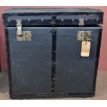 A wooden bound storage trunk with London retailer's label to the interior.