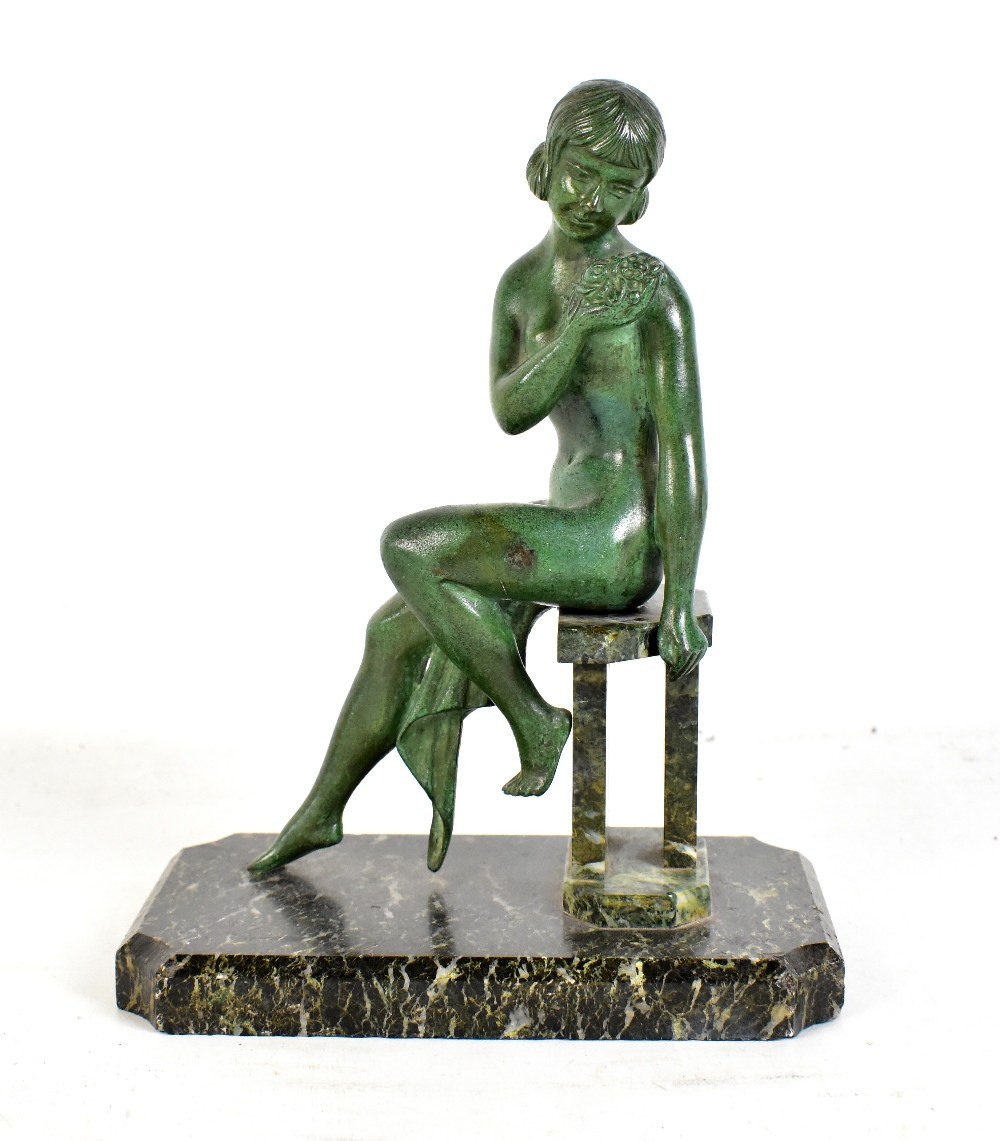 An Art Deco patinated bronze figure of a girl seated on a hardstone base, height 27cm.Additional