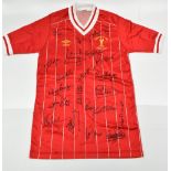 A rare 1984 European Cup Final Liverpool FC shirt worn by Mark Lawrenson and fully signed by the