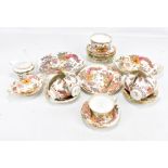 ROYAL CROWN DERBY; an 'Olde Avesbury' pattern part tea set with transfer decorated and over