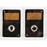 A cased Royal Canadian Mint Platinum Wedding Anniversary gold coin, 1/10oz, slabbed, with