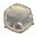 CHARLES BOYTON III; an Edward VII hallmarked silver salver with cast scalloped edge, chased floral
