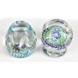 WHITEFRIARS; a tall faceted glass paperweight with Millefiori, signed with Monk to cane and dated