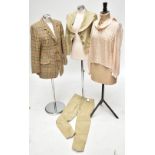 VIVIENNE WESTWOOD ANGLOMANIA; a cream cotton short jacket, size 38, and matching trousers, size