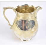 CJ VANDER LTD; an Elizabeth II hallmarked silver cream jug with reeded detail, London 1966, height
