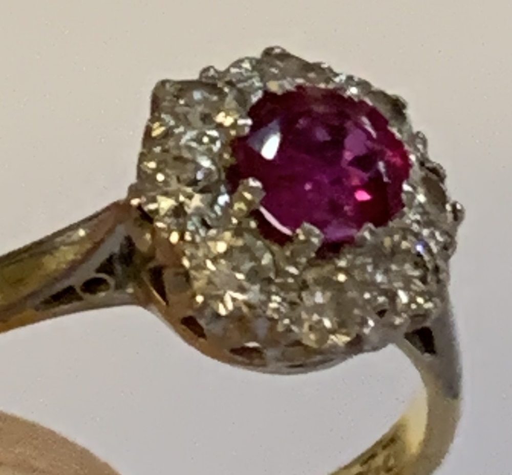 An 18ct yellow gold diamond and ruby cluster ring, the ruby weighing approx 0.25ct within a border - Image 4 of 4