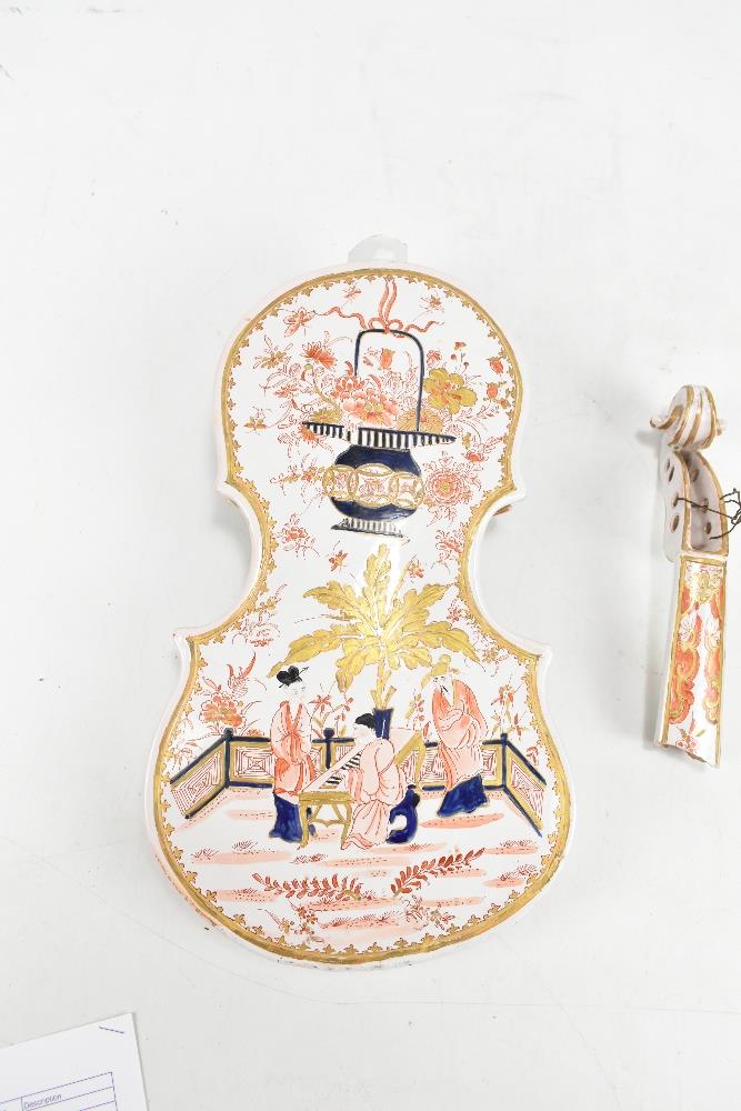 An unusual 19th century continental tin glazed model of a violin, life sized and decorated in the - Image 2 of 2