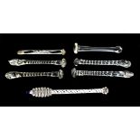 Seven Georgian glass sugar stirrers, some with candle and air twists (7).