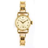 INTERNATIONAL WATCH CO (IWC); a lady's 14ct yellow gold wristwatch, the circular dial set with