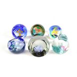 CAITHNESS; six glass paperweights, to include 'Holly', 'Balloon Seller', etc. Additional