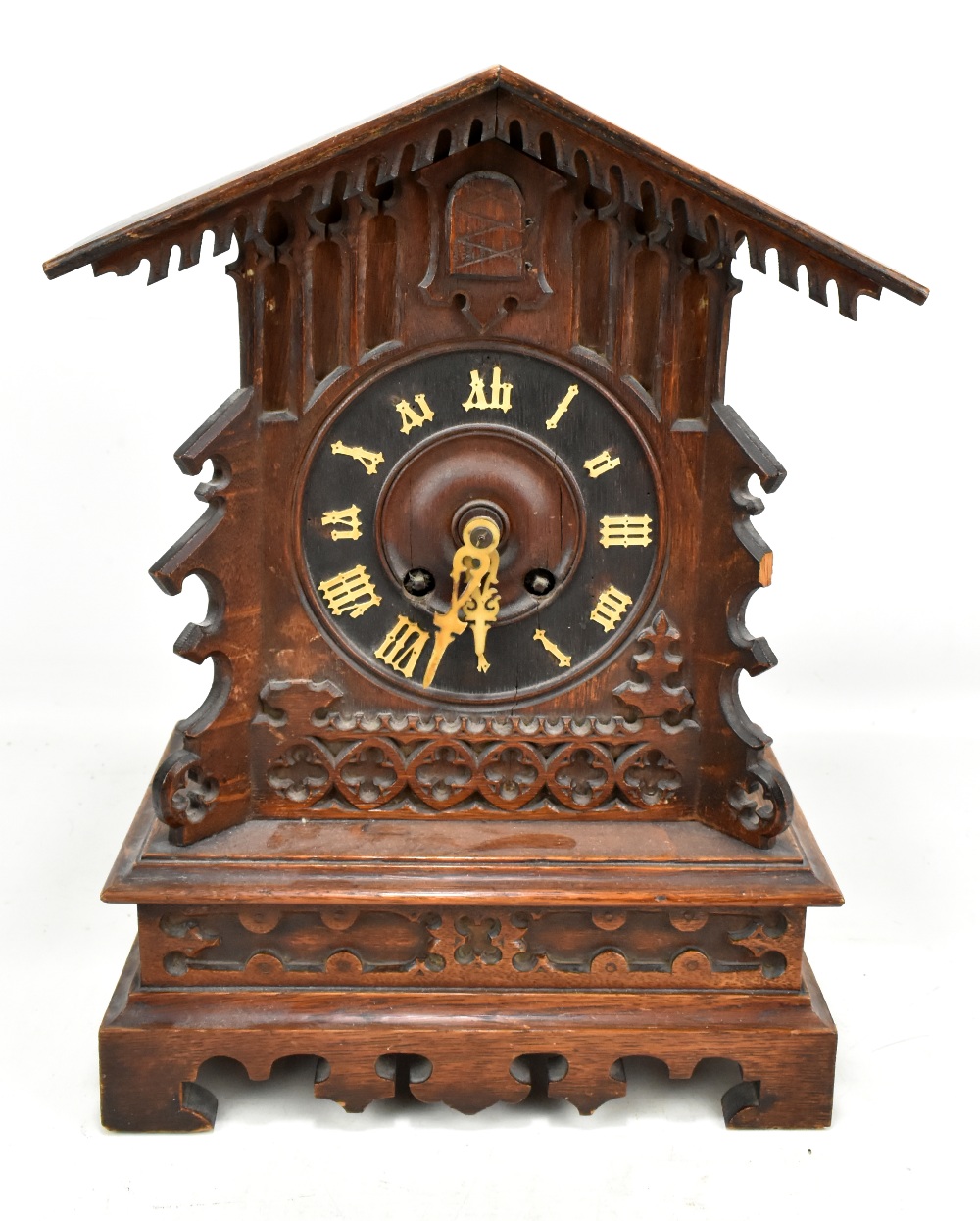 A late 19th/early 20th century Black Forest cuckoo clock for restoration, the circular dial set with