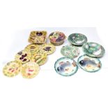 A group of majolica French faience leaf moulded tableware including French Sarraguemines saucers,