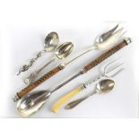 A hallmarked silver Kings pattern teaspoon, a hallmarked silver preserve spoon, a bread fork with