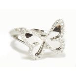 MESSIKA OF PARIS; an 18ct white gold and diamond butterfly ring, size M 1/2, approx 5.1g.