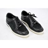 JIMMY CHOO, MIAMI; a pair of black and suede and patent men's trainers with a thick sole, leather