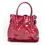 VALENTINO; a maroon red patent leather large handbag with two carry handles, suede lining, silver-